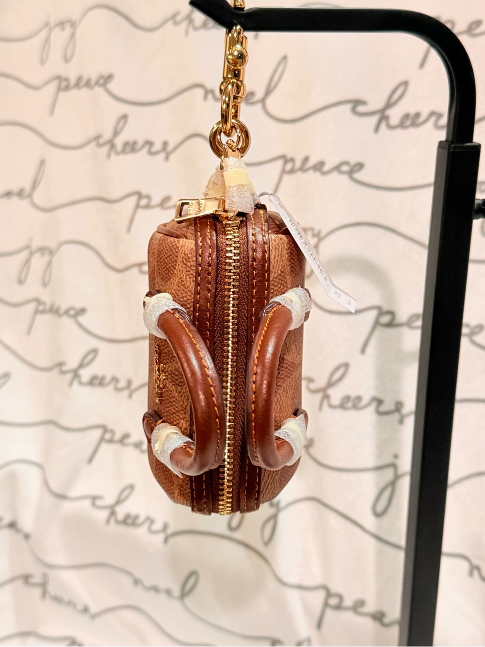 COACH Mini Rowan Bag Charm In Signature Canvas Gold Tan brown
Gold hardware NWT - Picture 3 of 4